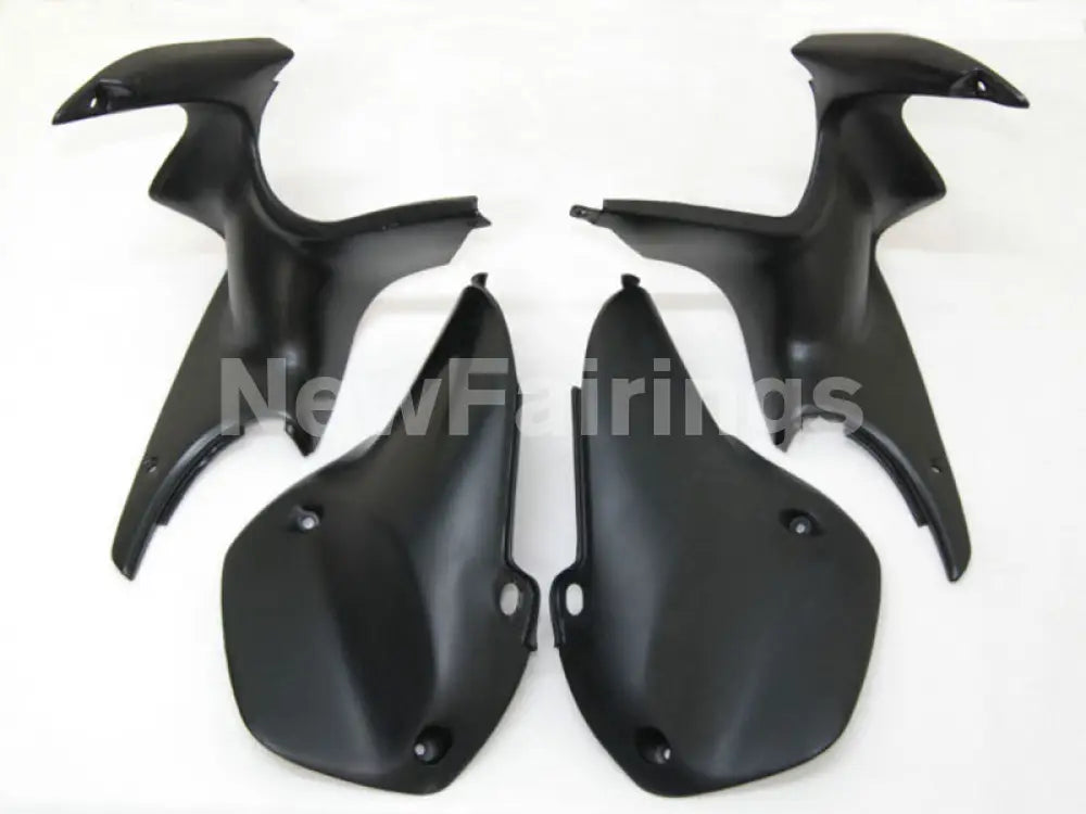 Black and Orange HM plant - CBR600 F4 99-00 Fairing Kit